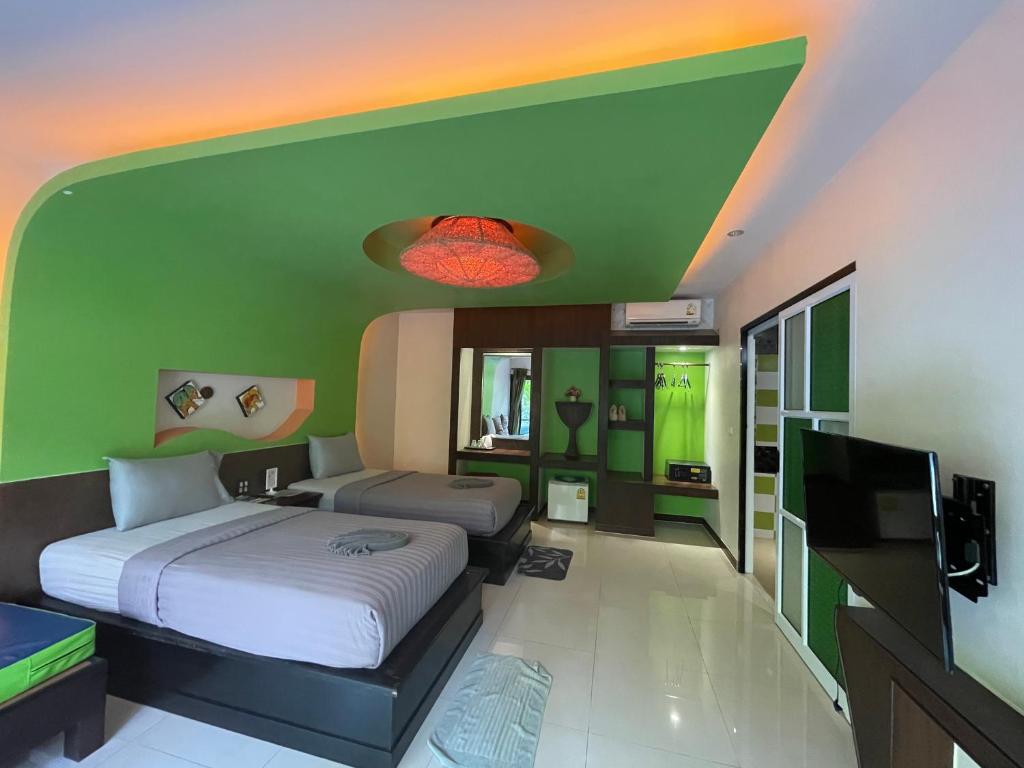 Двухместный (Двухместный номер Делюкс с 1 кроватью или 2 отдельными кроватями и балконом) курортного отеля AC 2 Resort, Ко Тао