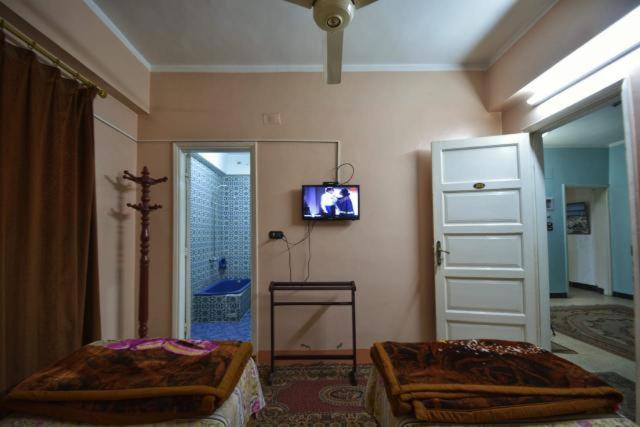 Двухместный (Двухместный номер с 1 кроватью или 2 отдельными кроватями и ванной комнатой) хостела Fontana Luxor Hostel, Луксор