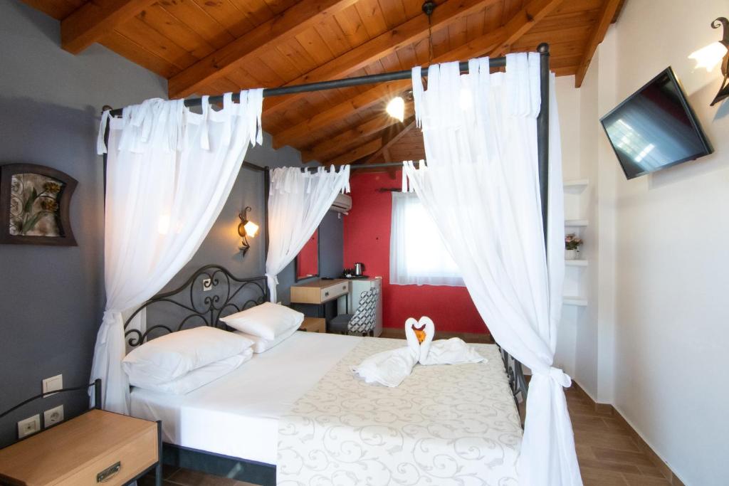 Двухместный (Двухместный номер Делюкс с 1 кроватью и балконом, вид на море) гостевого дома Coralli Rooms, Элафонисси