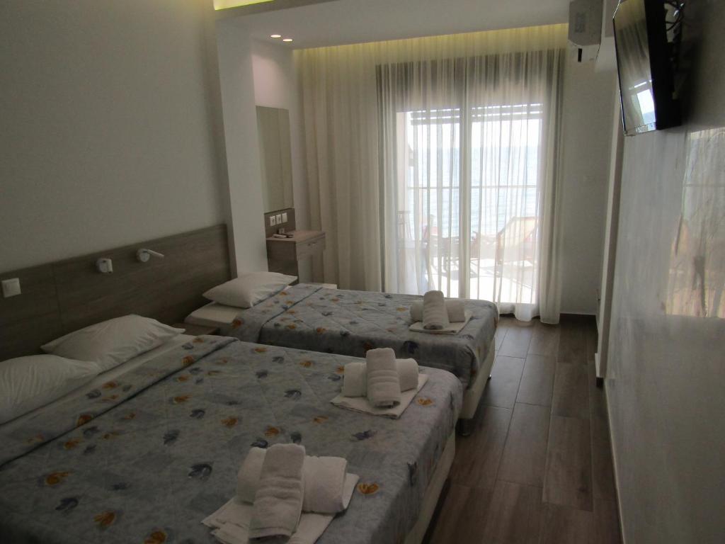 Двухместный (Двухместный номер с 1 кроватью или 2 отдельными кроватями - Подходит для гостей с ограниченными физическими возможностями) отеля Hotel Zefyros, Паралия Катерини