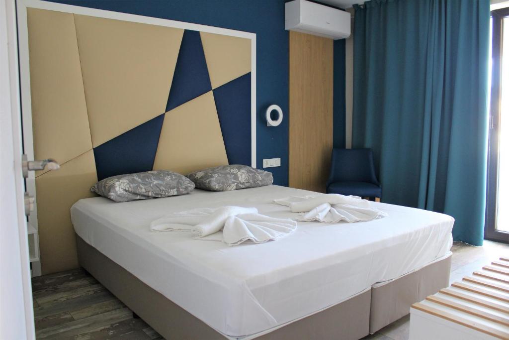 Двухместный (Двухместный номер Делюкс с 1 кроватью или 2 отдельными кроватями) гостевого дома ADMIRAL POTOS studios, Потос