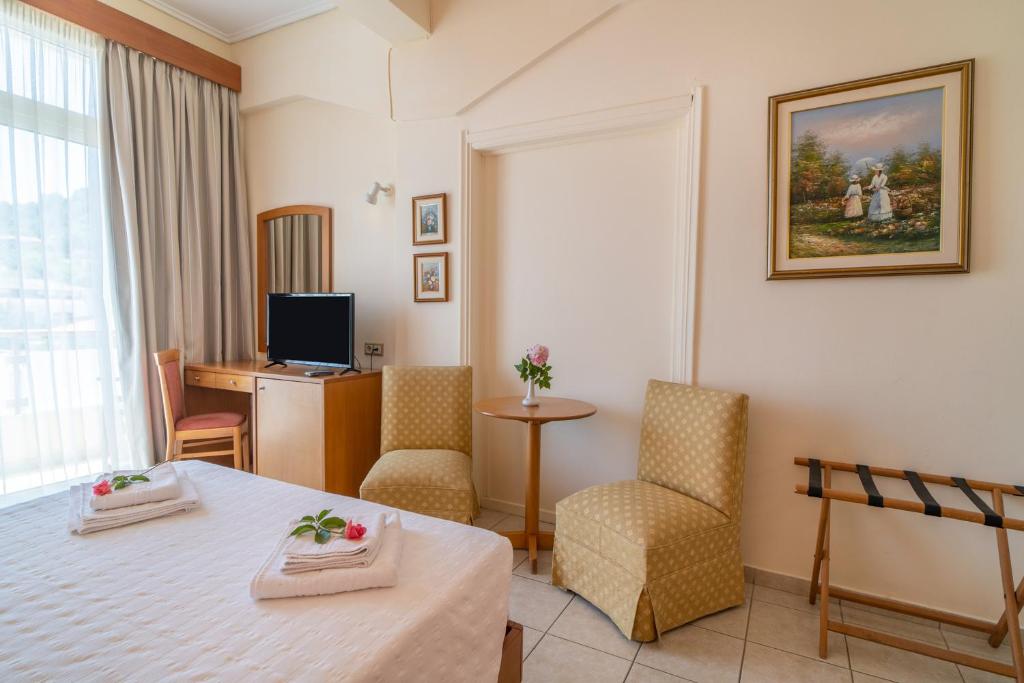 Двухместный (Стандартный двухместный номер с 1 кроватью или 2 отдельными кроватями) отеля Neda Hotel, Олимпия, Пелопонесс, Западная Греция и Ионния