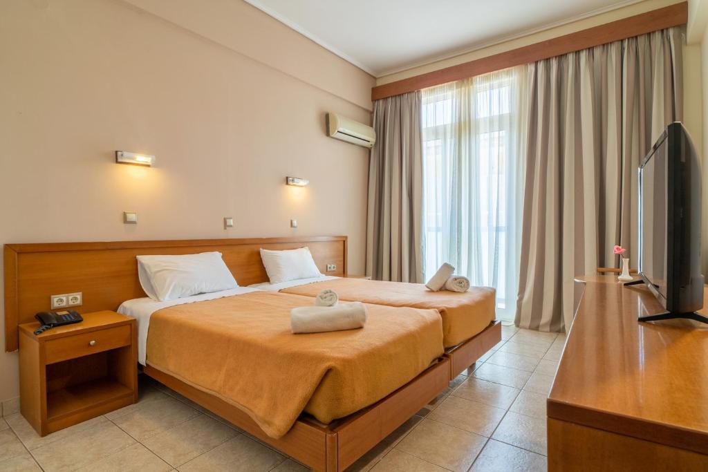 Двухместный (Двухместный номер эконом-класса с 2 отдельными кроватями) отеля Neda Hotel, Олимпия, Пелопонесс, Западная Греция и Ионния