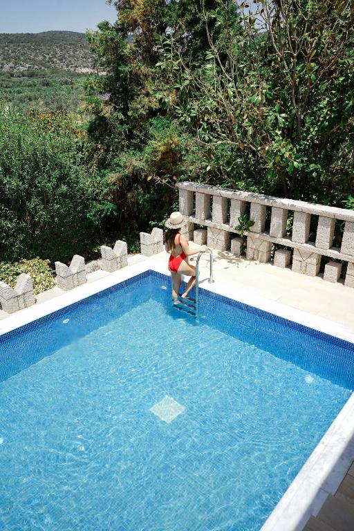 Сьюит (Представительский люкс с собственным бассейном) курортного отеля Kandia's Castle Resort & Thalasso Nafplio, Кандия