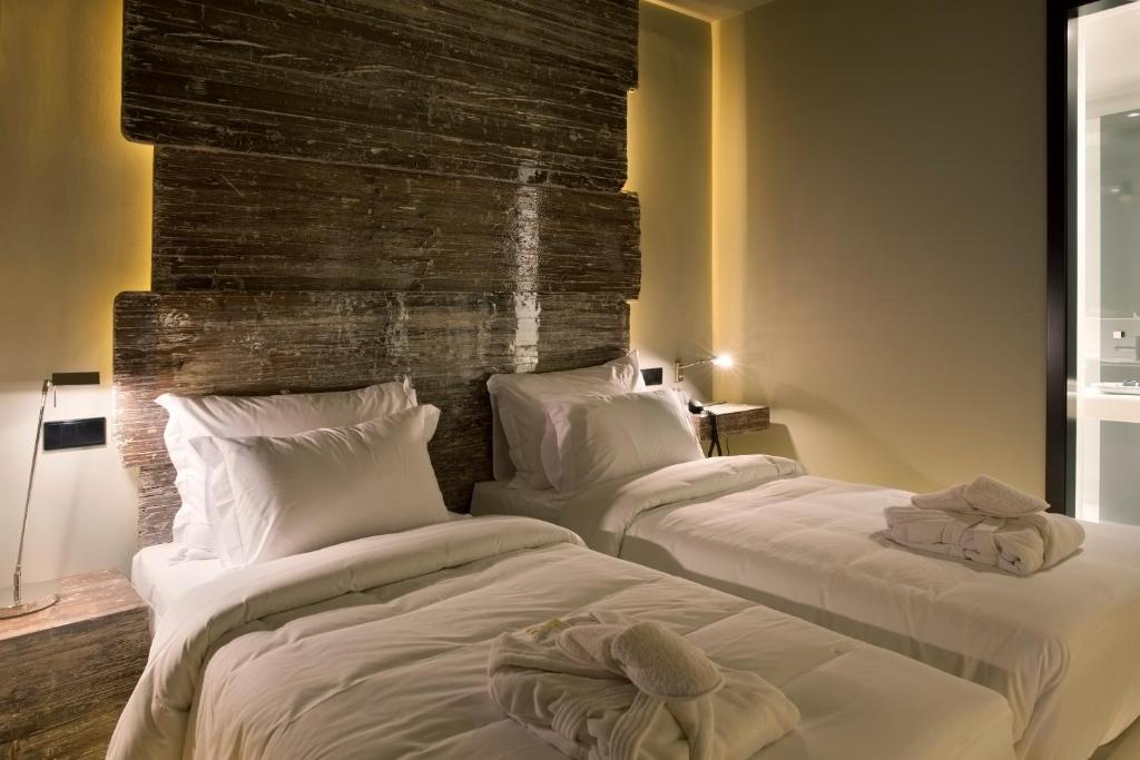 Двухместный (Двухместный номер с 2 отдельными кроватями - Новодний пакет услуг) отеля Vitoria Stone Hotel, Эвора