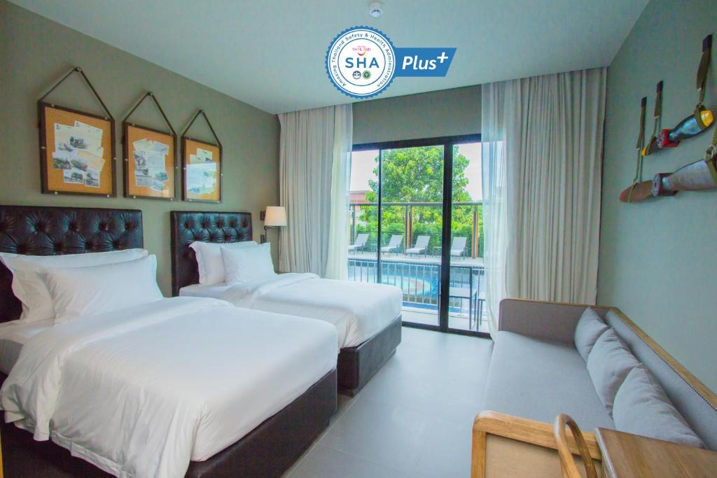 Двухместный (Двухместный номер Делюкс с 1 кроватью или 2 отдельными кроватями, доступ к бассейну) отеля Marina Express-AVIATOR-Phuket Airport, Пхукет