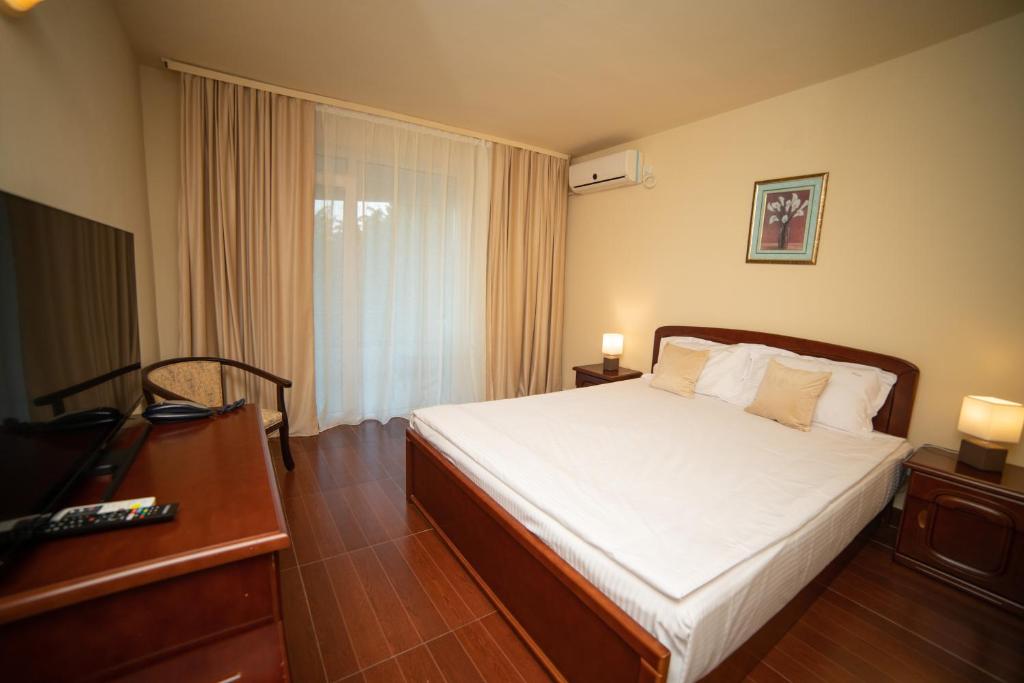 Двухместный (Стандартный двухместный номер с 1 кроватью или 2 отдельными кроватями) отеля Hotel Corina, Венус