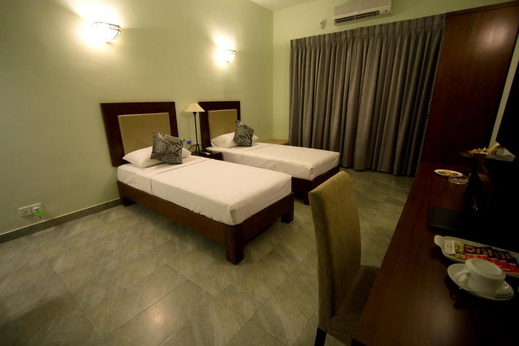 Двухместный (Улучшенный двухместный номер с 1 кроватью или 2 отдельными кроватями) отеля Ellen's Place, Коломбо