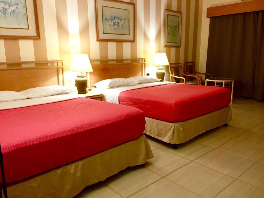 Двухместный (Улучшенный двухместный номер с 1 кроватью или 2 отдельными кроватями, вид на город) апарт-отеля Masaya Hurghada, Хургада