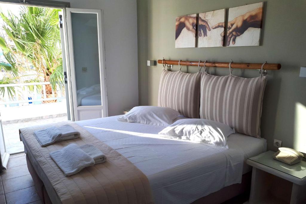 Двухместный (Стандартный двухместный номер с 1 кроватью или 2 отдельными кроватями) отеля Hotel Arkoulis, Науса