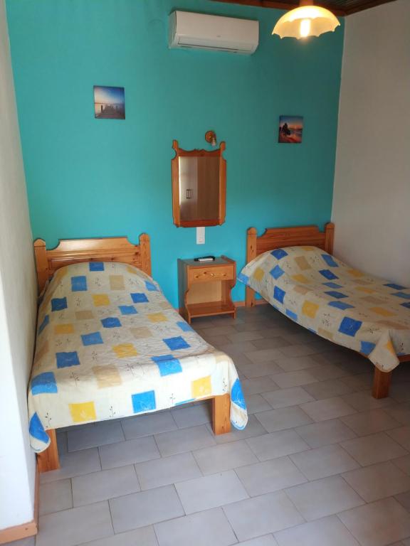 Двухместный (Стандартный двухместный номер с 2 отдельными кроватями) апарт-отеля Asimina's House, Скиатос