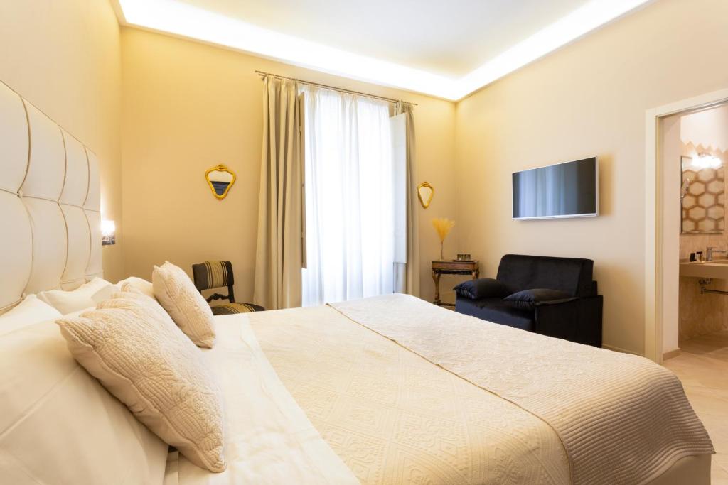 Двухместный (Улучшенный двухместный номер с 1 кроватью и балконом) отеля Maecò Ortigia B&B, Сиракузы