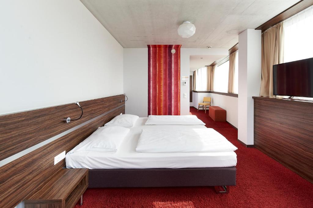 Двухместный (Двухместный номер «Комфорт Плюс» с 2 отдельными кроватями) отеля Simm's Hotel, Вена
