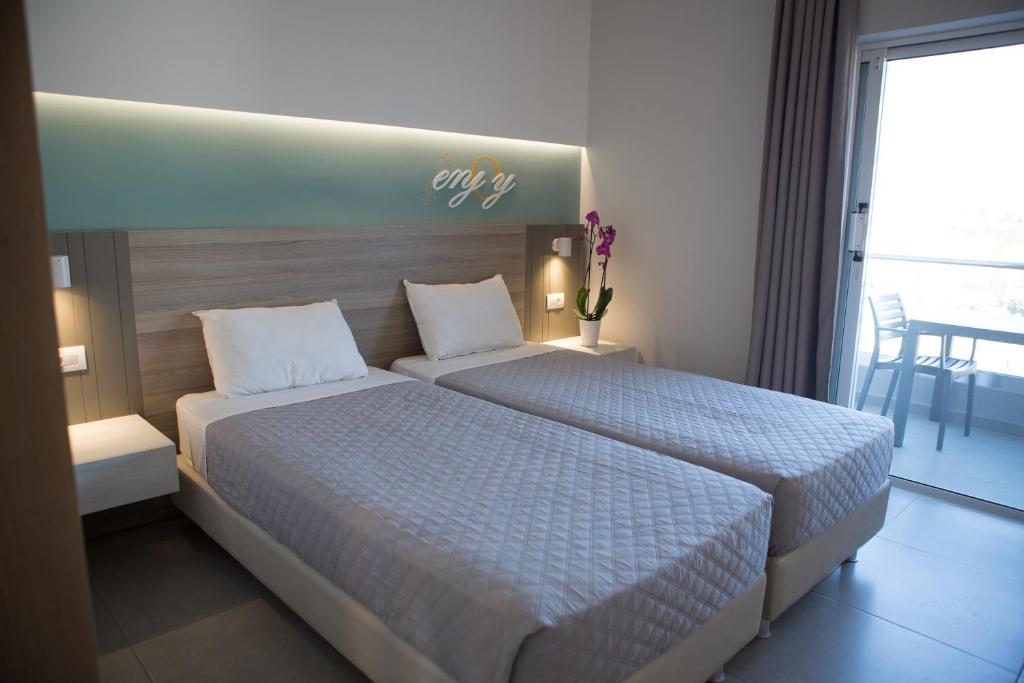 Двухместный (Улучшенный двухместный номер с 1 кроватью или 2 отдельными кроватями и видом на сад) апарт-отеля Gelli Apartments, Кос