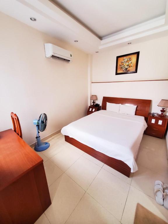 Двухместный (Большой двухместный номер с 1 кроватью) отеля Thanh An Hotel, Хошимин