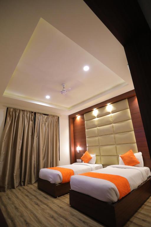 Двухместный (Двухместный номер Делюкс с 1 кроватью или 2 отдельными кроватями) отеля Agra Hotels Marygold, Агра