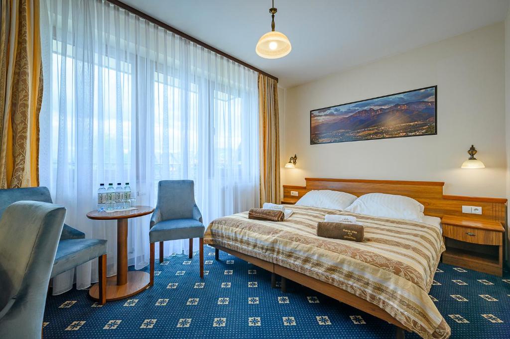 Двухместный (Стандартный двухместный номер с 1 кроватью или 2 отдельными кроватями) отеля Hotel Liptakówka, Бялка