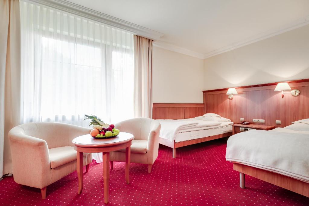 Двухместный (Небольшой двухместный номер с 2 отдельными кроватями) отеля Hotel Konradówka, Карпач