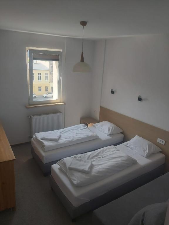 Двухместный (Двухместный номер с 1 кроватью и собственной ванной комнатой) хостела OperaHostel, Быдгощ