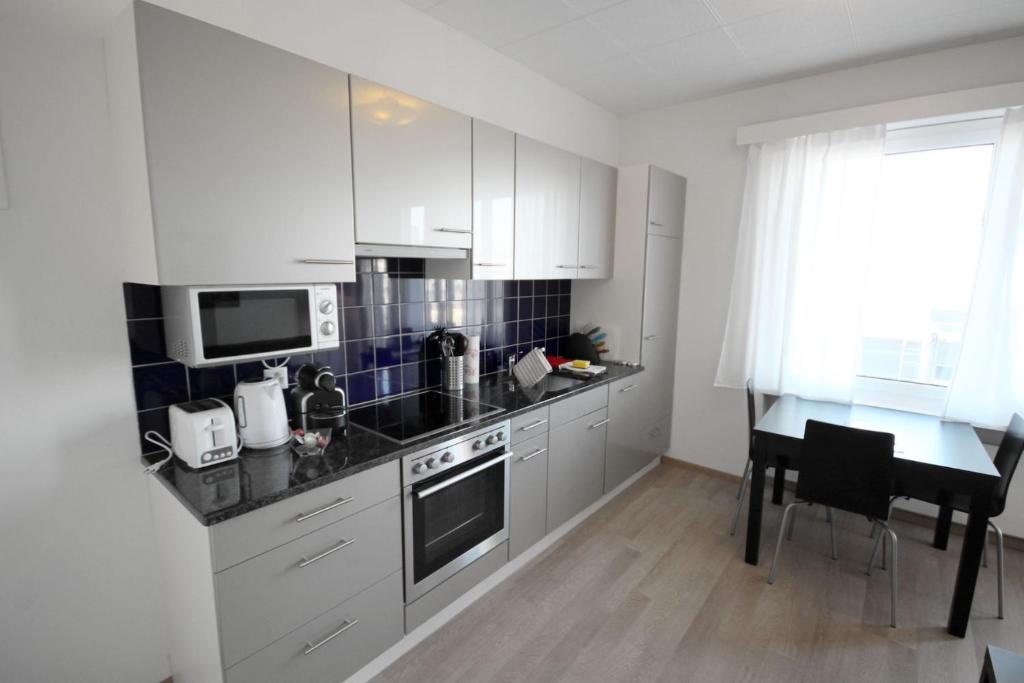 Апартаменты (One Bedroom Apartment with balcony K), HITrental Letzigrund - Apartment