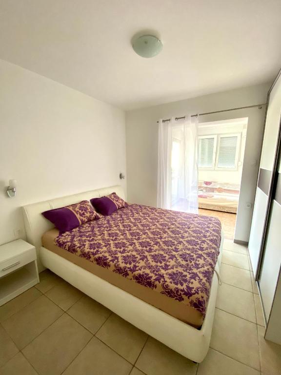 Двухместный (Двухместный номер с 2 отдельными кроватями и дополнительной кроватью) апартамента Apartments Popović, Будва