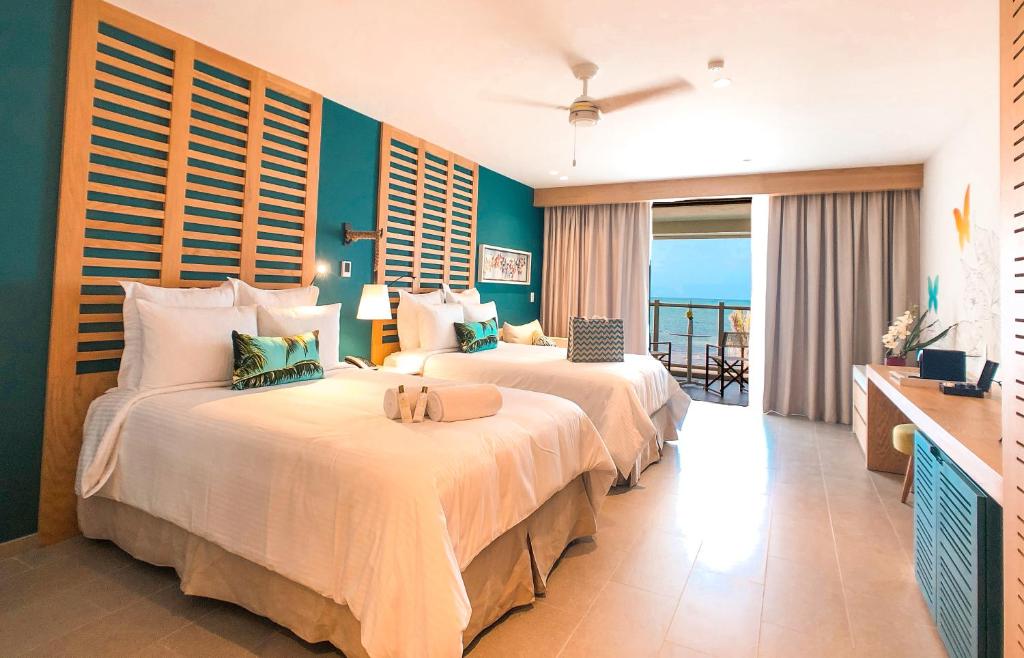 Двухместный (Предпочитаемый клубный двухместный номер с 1 кроватью и видом на океан) курортного отеля Dreams Natura Resort & Spa - All Inclusive, Пуэрто-Морелос