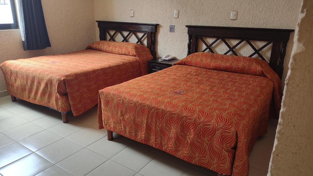 Двухместный (Стандартный двухместный номер с 2 отдельными кроватями) отеля Hacienda de Castilla, Канкун