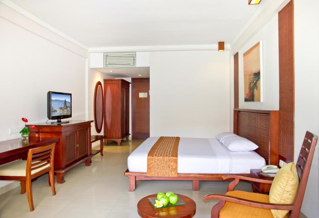 Двухместный (Двухместный номер Делюкс с 1 кроватью или 2 отдельными кроватями) отеля The Rani Hotel & Spa, Кута