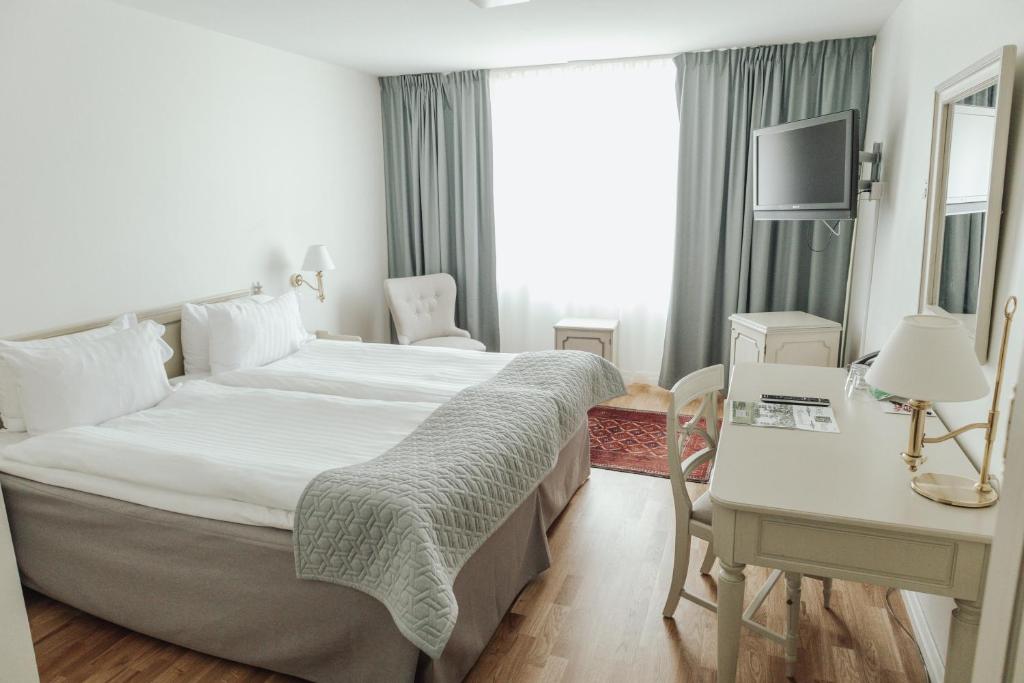 Двухместный (Двухместный номер с 2 отдельными кроватями) отеля Blommenhof Hotel, Нючепинг