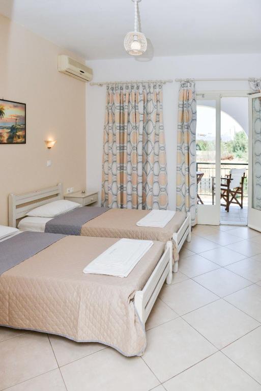 Двухместный (Стандартный двухместный номер с 2 отдельными кроватями) гостевого дома Sunshine, Наксос