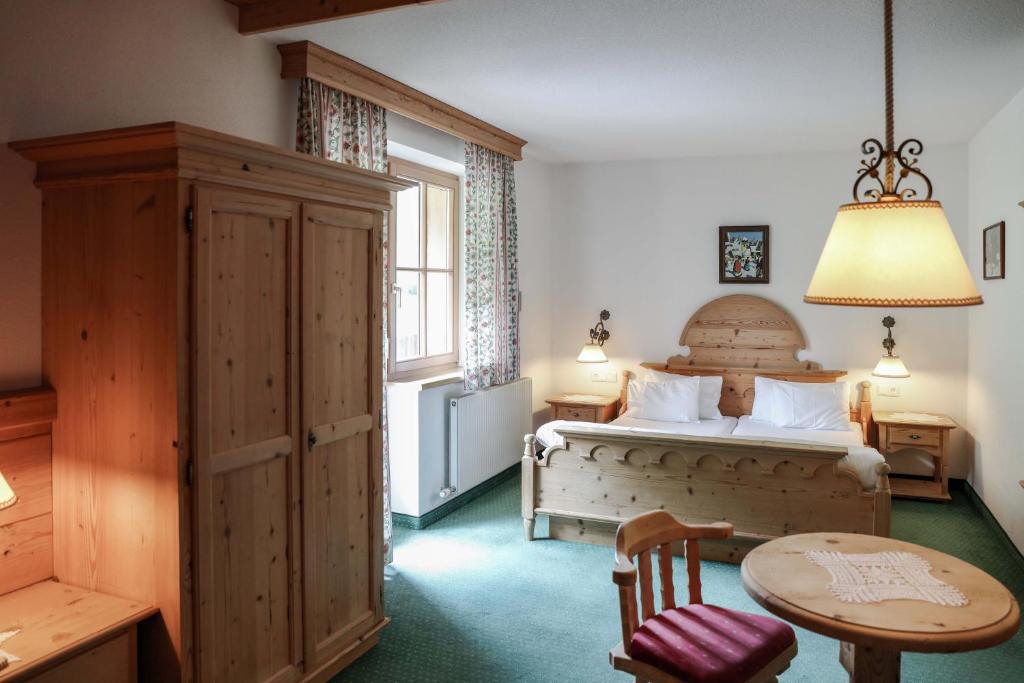 Двухместный (Двухместный номер Делюкс с 1 кроватью) отеля Alpenromantik-Hotel Wirlerhof, Ишгль
