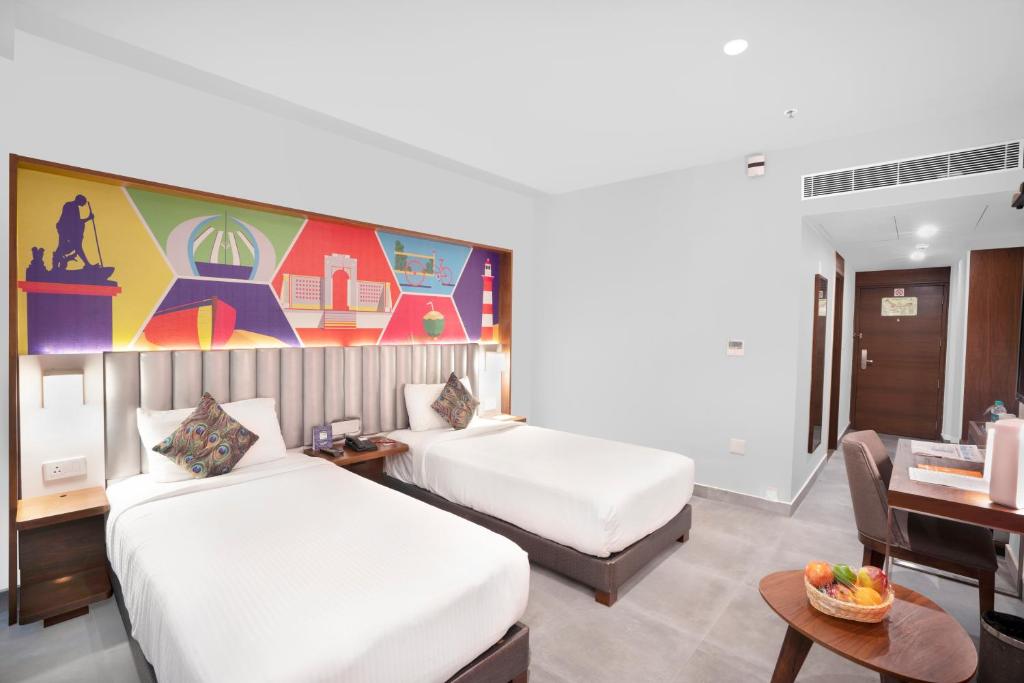 Двухместный (Premium Twin Bed Room With 25% Off on Food and Soft Beverages Until Jul 2021) отеля The Belstead, Ченнаи