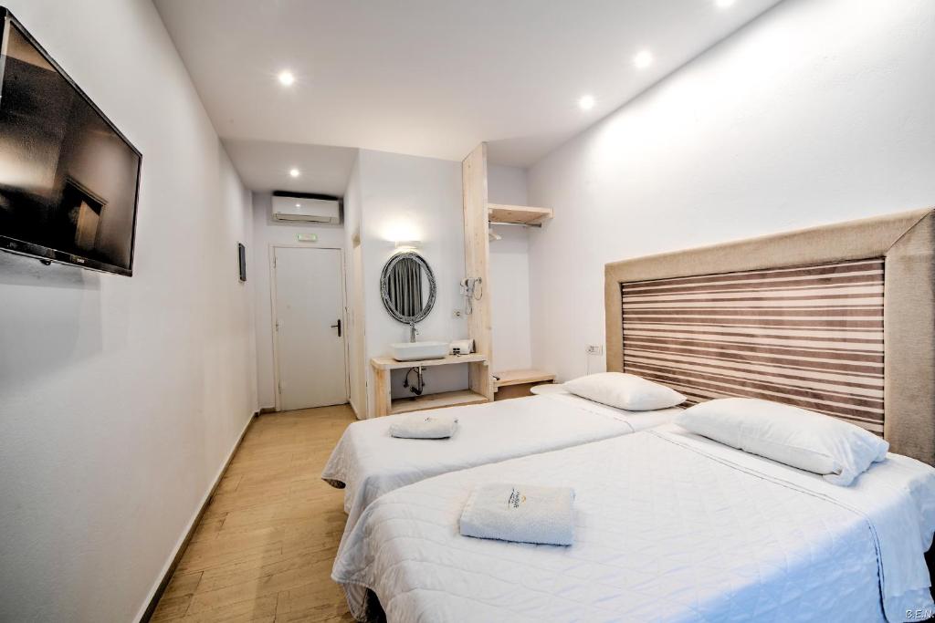 Двухместный (Улучшенный двухместный номер с 1 кроватью или 2 отдельными кроватями) отеля Anamar Santorini, Монолитос