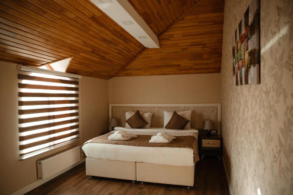 Двухместный (Двухместный номер Делюкс с 1 кроватью и балконом) отеля Villa Inn, Баку