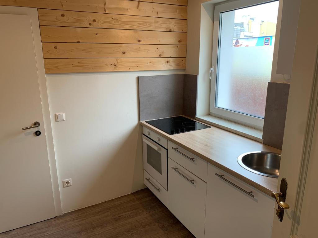 Номер (Two-Bedroom Apartment with Garden and Terrace Austrasse 5), Book-A-Room City Apartment Salzburg