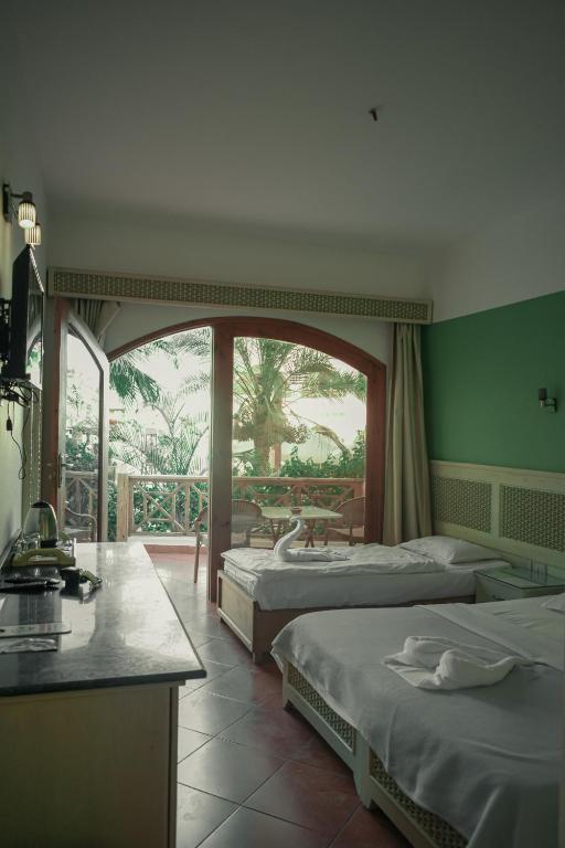 Двухместный (Двухместный номер Делюкс с 1 кроватью) курортного отеля Planet Oasis Resort Dahab, Дахаб