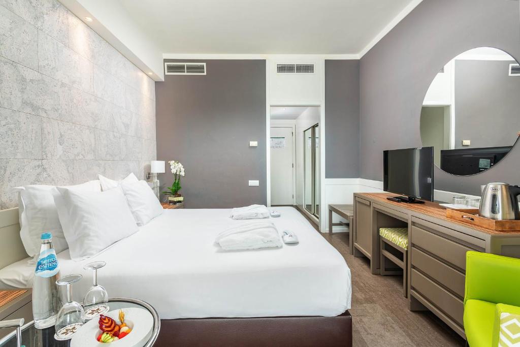Двухместный (Двухместный номер эконом-класса с 1 кроватью или 2 отдельными кроватями) отеля Hotel Eva, Фару