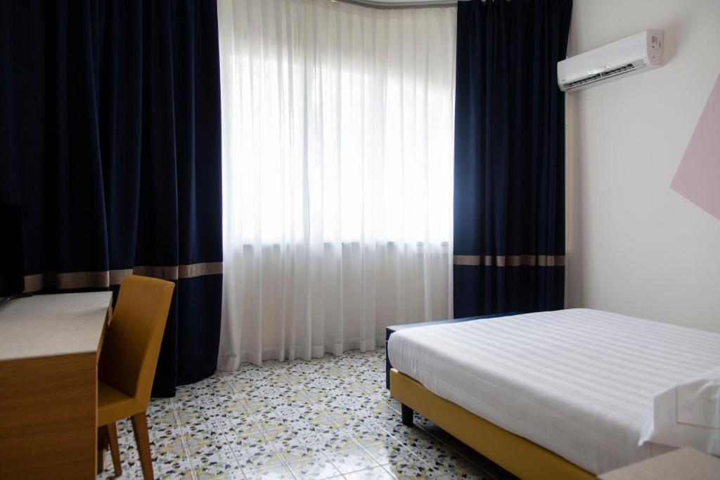 Двухместный (Стандартный двухместный номер с 1 кроватью или 2 отдельными кроватями — Первый этаж) отеля Grand Hotel, Форте-дей-Марми