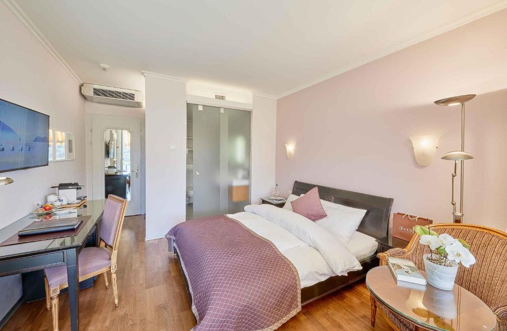 Двухместный (Comfort Grand-lit Double Room with bay view) отеля Eden Swiss Quality Hotel, Шпиц