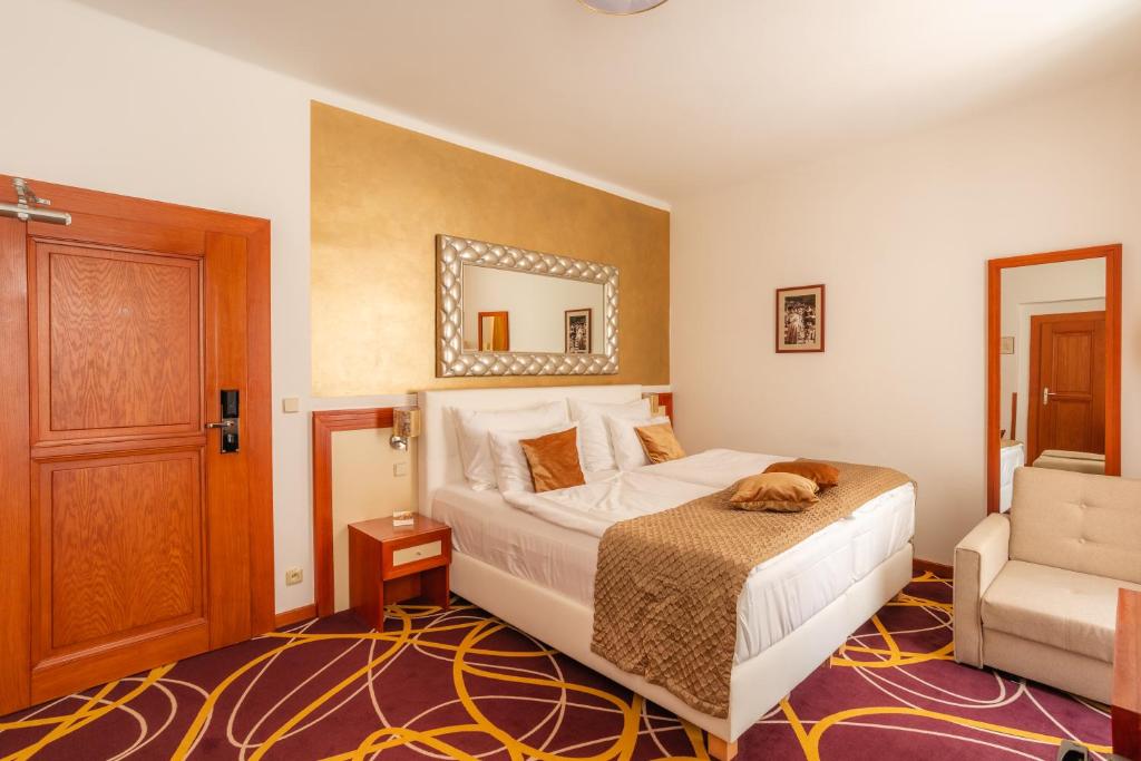 Двухместный (Двухместный номер Делюкс с 1 кроватью или 2 отдельными кроватями) отеля Bellevue Cesky Krumlov, Чески-Крумлов