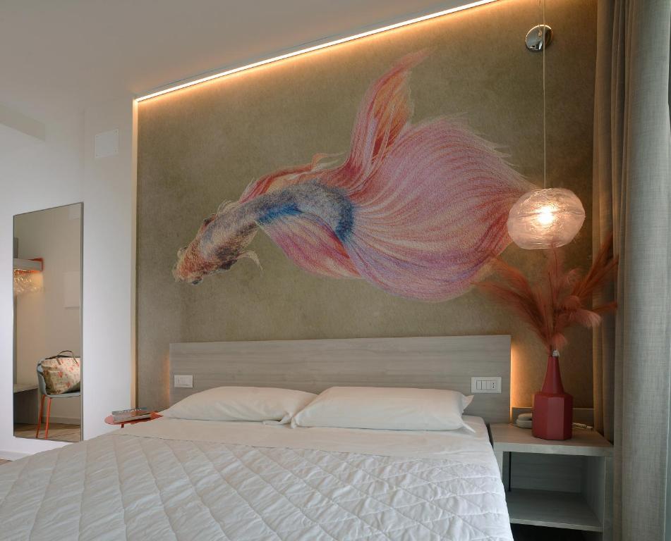 Двухместный (Двухместный номер с двуспальной кроватью и дополнительной кроватью) отеля Alla Pergola, Бибионе