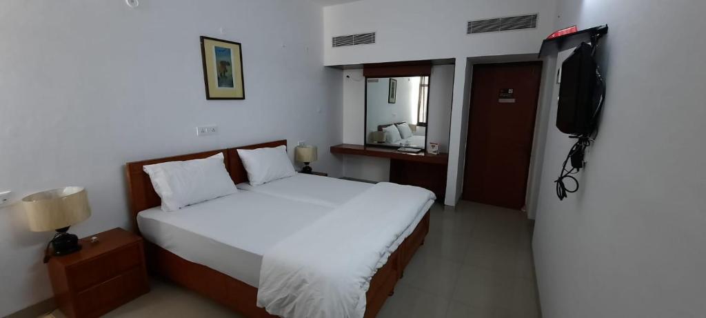 Двухместный (Стандартный двухместный номер с 1 кроватью или 2 отдельными кроватями) хостела New Delhi YMCA Tourist Hostel, Нью-Дели