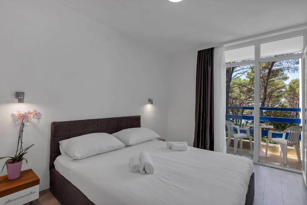 Двухместный (Двухместный номер с 1 кроватью или 2 отдельными кроватями - В дополнительном здании) отеля Hotel Alem, Башка-Вода