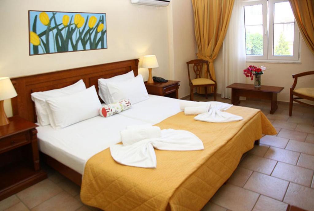 Двухместный (Двухместный номер с 2 отдельными кроватями, вид на сад) отеля Alexander House Hotel, Агия-Пелагия