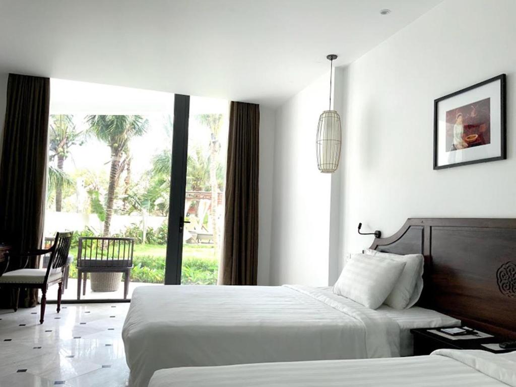 Двухместный (Двухместный номер с 1 кроватью, вид на сад) курортного отеля The Palmy Phu Quoc Resort & Spa, Дуонг-Донг