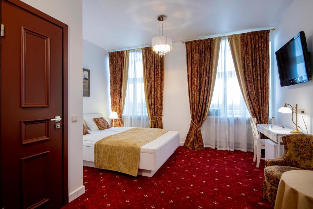 Двухместный (Двухместный номер на цокольном этаже) отеля Hotel Gutenbergs, Рига