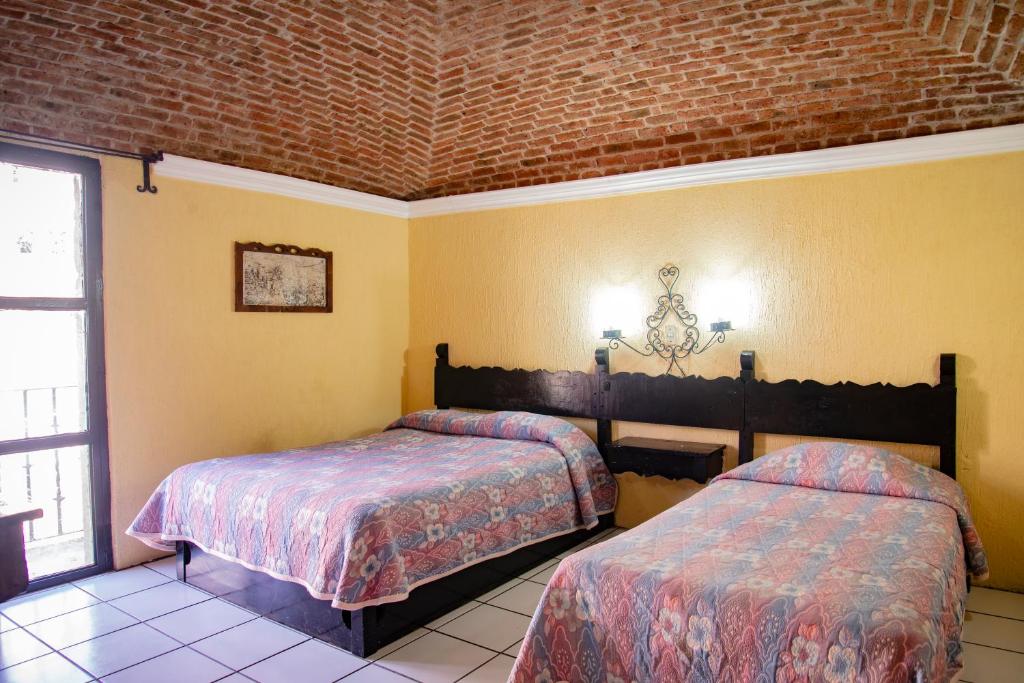 Семейный (Семейный двухместный номер с 1 кроватью) отеля Hotel Hacienda de Cobos, Гуанахуато