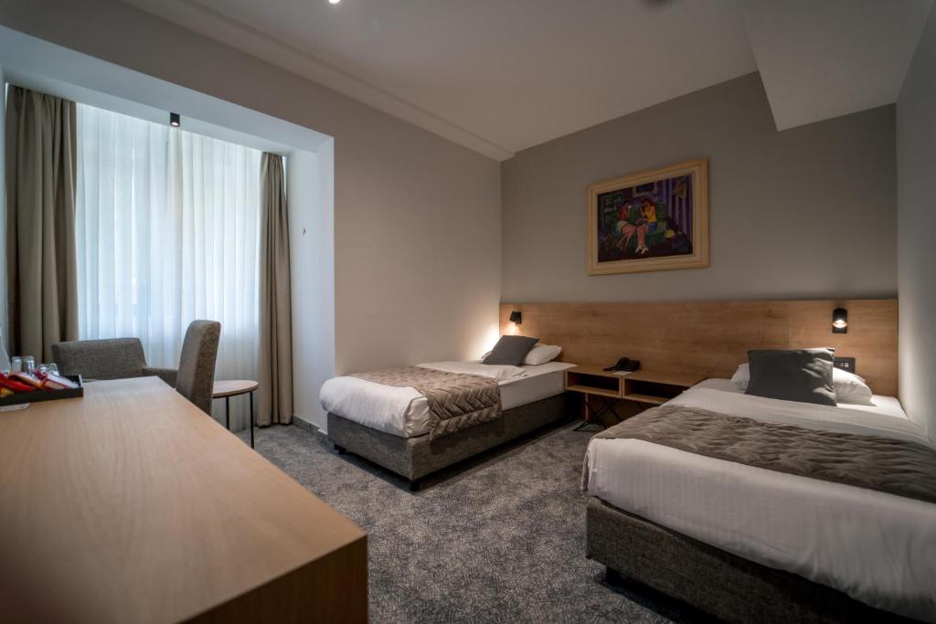 Двухместный (Стандартный двухместный номер с 1 кроватью или 2 отдельными кроватями) отеля Hotel Zlatibor Mona, Златибор