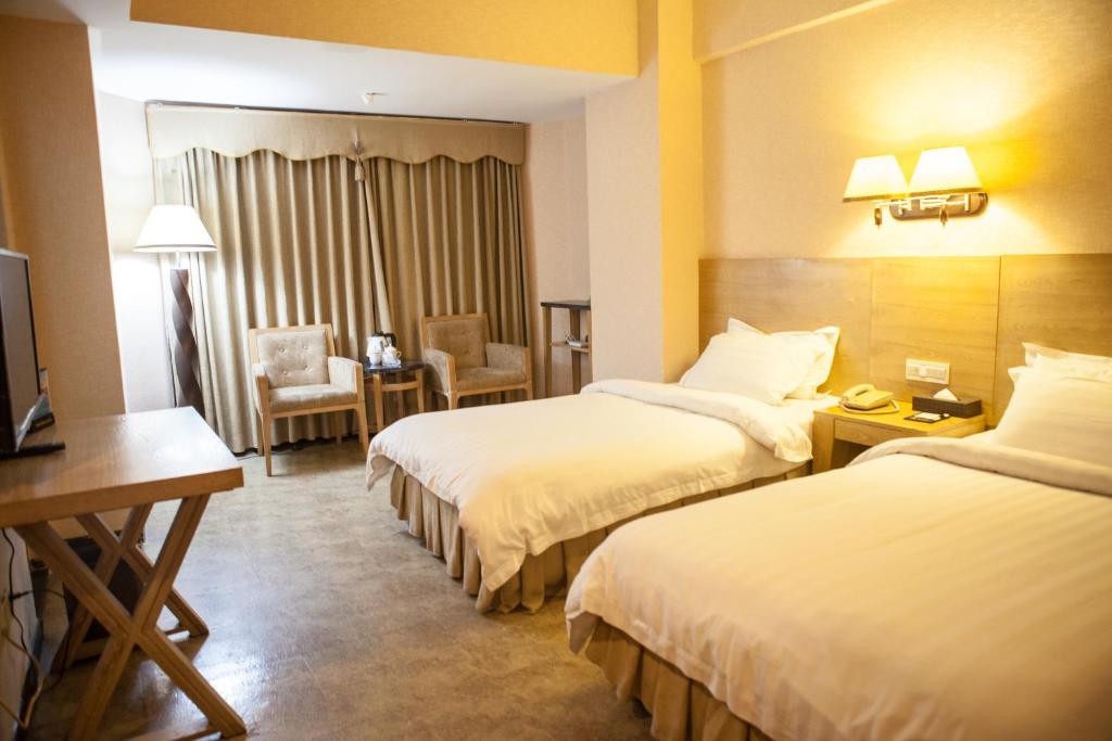 Двухместный (Стандартный двухместный номер с 2 отдельными кроватями) отеля Fuhao Hotel, Гуанчжоу