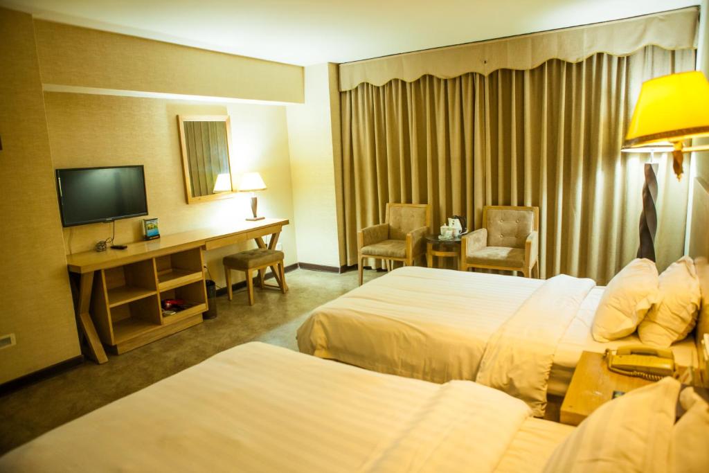 Двухместный (Двухместный номер Делюкс с 2 отдельными кроватями) отеля Fuhao Hotel, Гуанчжоу